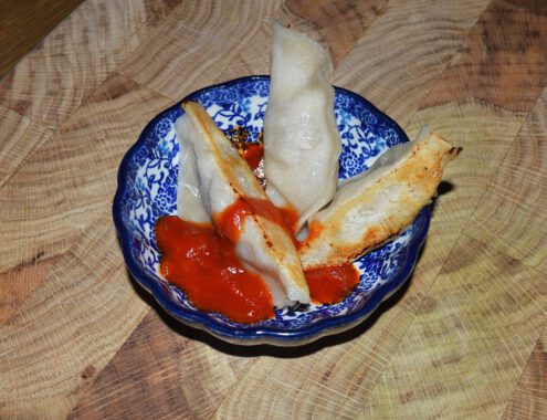 Lamsdumpling met zoetzuur sausje